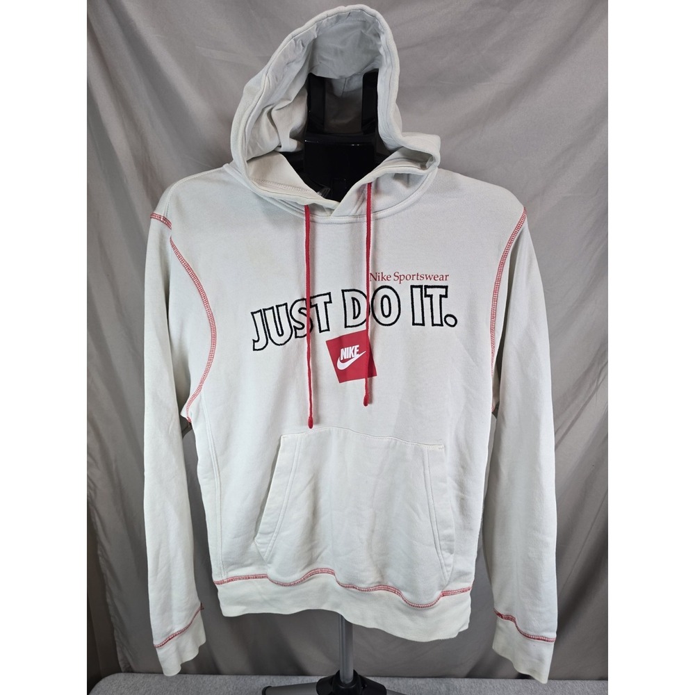white Nike Sportswear JDI hoodie features contrasting red drawcords and red...